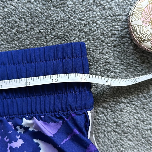 Two pair of Under Armour running shorts. - Picture 10 of 11